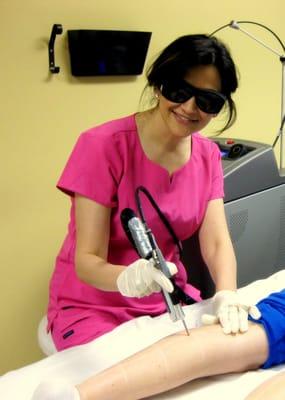 Our Owner Aisha working on laser hair removal.