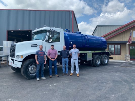 Owner (middle right) Richard purchasing new truck from Pik Rite. With sons Matt (left) Mike (right). 2020