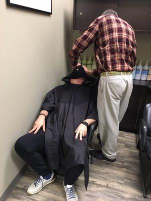 Hot towel treatment with any men's hair service  (Excludes barbershop days)