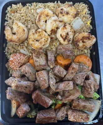 Come try our chicken and steak duo with fried rice and veggies