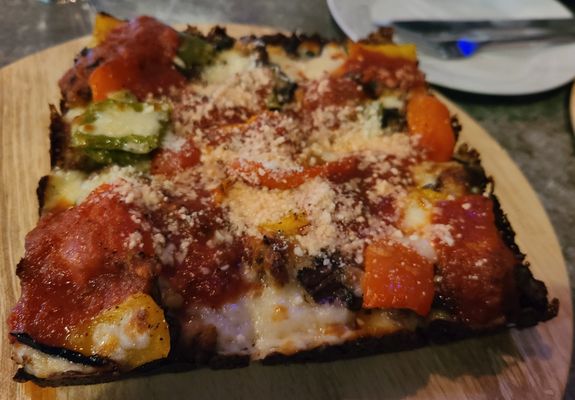 Pizza w/ sausage, mushrooms, and peppers.