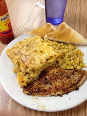 I ate it all and it was just as delicious as it looks! Grilled fish, Mac and cheese, and corn!