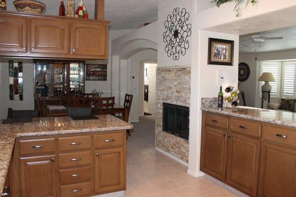 The New Counter tops and Kitchen Fireplace Simon Form Oasis Floors Installed