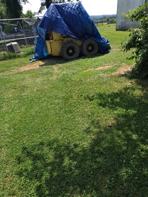 Picture of one of my skidloader I do small excavating with and other work