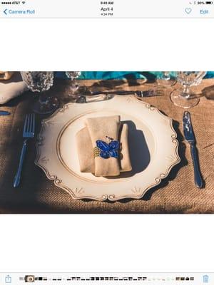 Rustic place settings. Charger plates and burlap napkin and tablecloth available for rent.