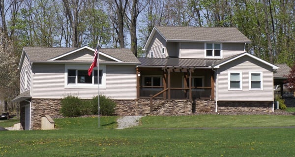 Existing house with a 1950's passenger bus built into structure.