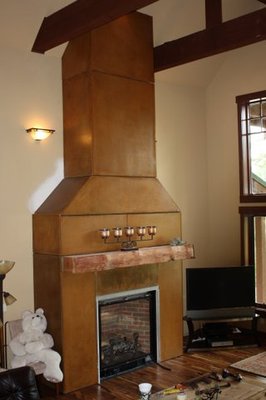 One of a kind18 piece pre-cast acid stained and sealed concrete fireplace surround in Suncadia.