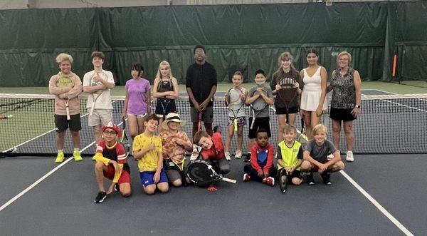 Champion's Tennis Camp participants and coaches