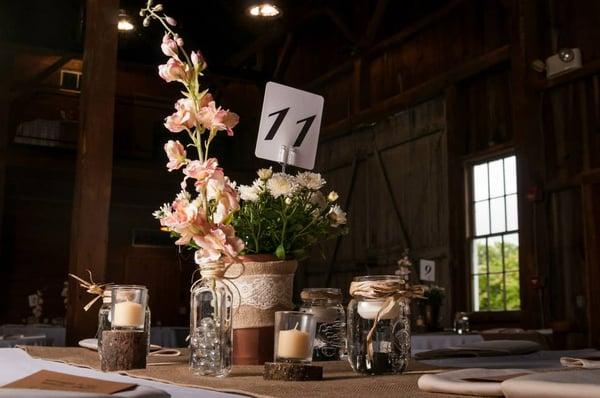 A beautiful barn wedding--earthy chic centerpiece.