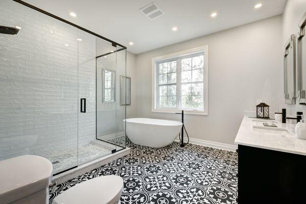 Master bath walk-in shower tilework. Custom luxury design tile install.