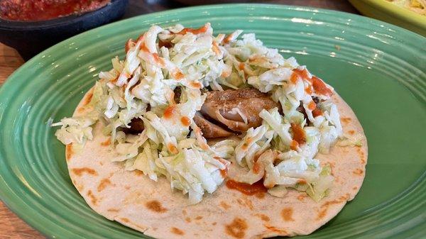 Fish taco on flour.