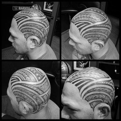 Polynesian head tattoo