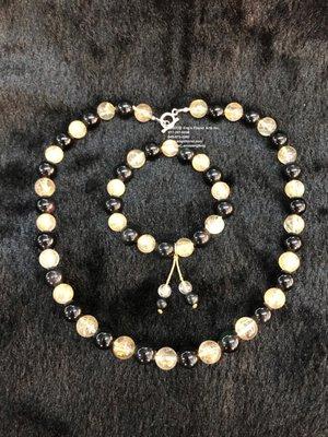 Rutilated quartz and obsidian bracelet and necklace