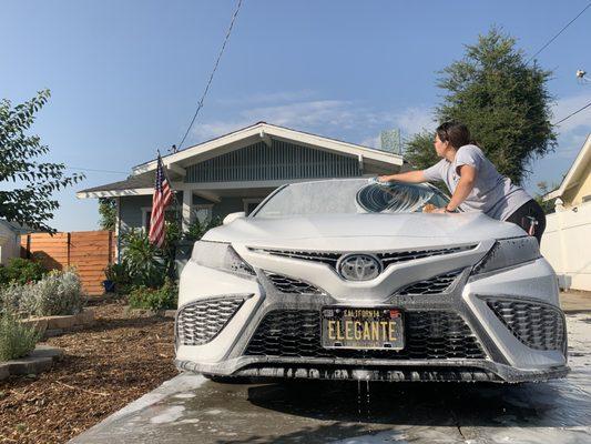 "Wash & Vac" White Toyota Camry