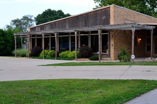 Front shot of Station 710 Salon.  Salon is next door to the Ozark House Restaurant.