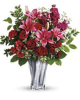 Gorgeous bouquet of red roses and pink lilies.