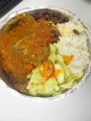 Bistec Entomatado with Rice and beans and salad.