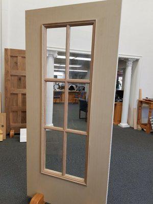 Custom glass insert with real Oakwood for the true divided light and frame for fiberglass doors