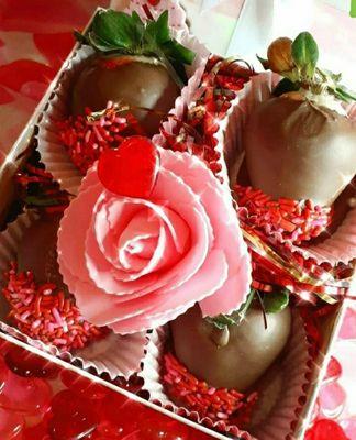 Classic strawberries dipped in milk chocolate W/ pink and white sprinkles.