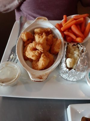 Shrimp with carrots and baked potato