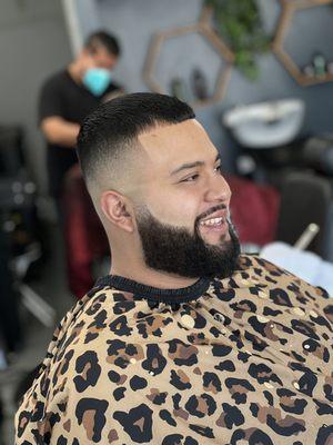 Mid-high skin fade by Luis the Barber.