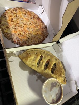 Calzone and pepperoni pizza