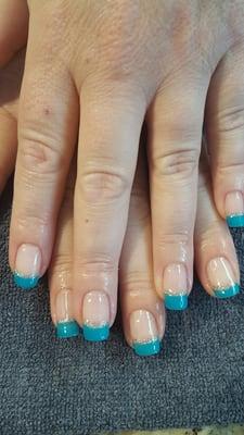 Showing off some beautiful natural nails my client has with a teal French tip