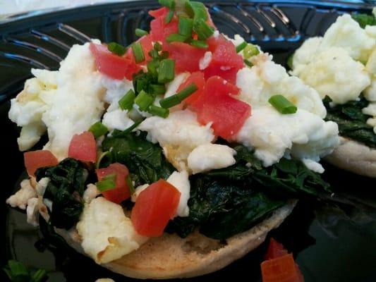 yummy, scrambled egg whites with spinach, feta, tomatoes...on an english muffin