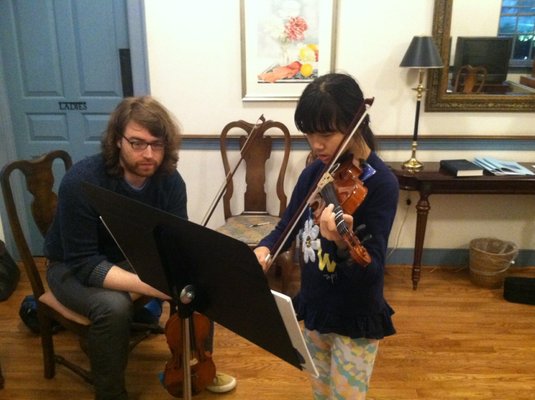 Violin teacher, Rick Henry, with his violin student.