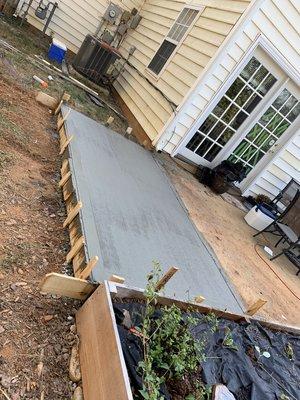 This Concrete Slab was just what this Huntersville homeowner wanted in order to extend her patio for her many friends and family!