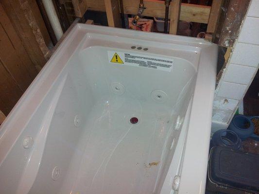 Fiberglass bathtub installed