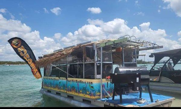 Nauti Girl Bad Bouy Bbq boat can be found at Keewaydin Island.