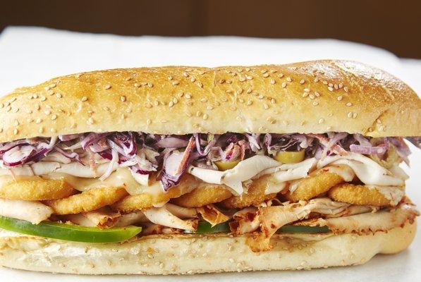 The Fairy Fay, order it by name and you'll get chipotle chicken, smoked turkey, bell peppers, slaw, onion rings, cayenne and melted cheese.