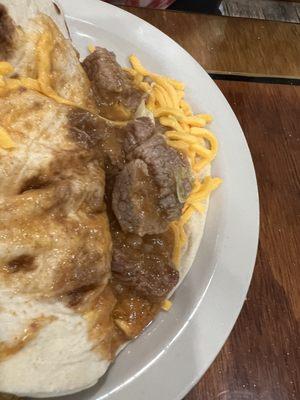 Carne guisada with cheese