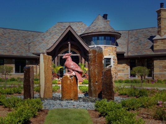 These are large scale Basalt Column fountains (7', 6', 4', and 3' tall fountains) with a custom carved Imperial Red Granite Cardinal Statue.