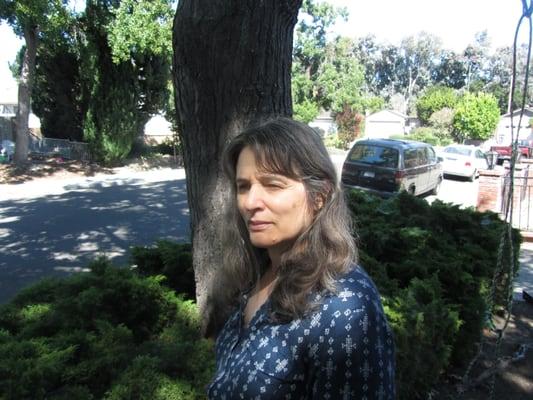 Deborah Olenev in front yard at 59 Paul Ave.