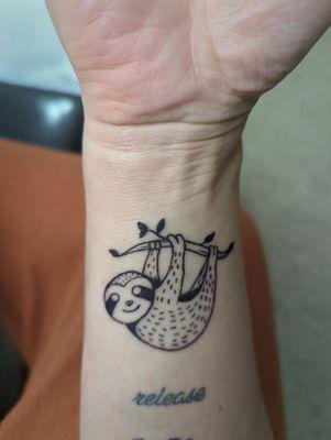 My illustrative sloth tattoo.