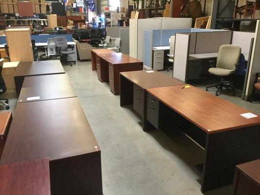 huge selection of new and used desks in stock.