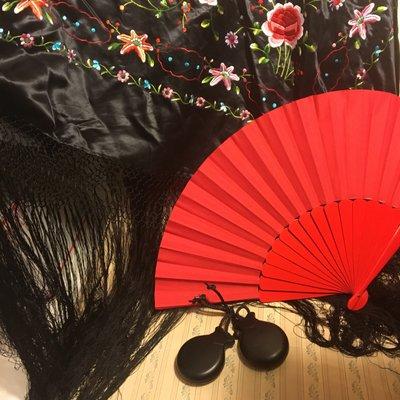 Shawl, fan and castanets.