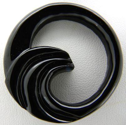 Custom carving in black onyx I created for a jeweler.