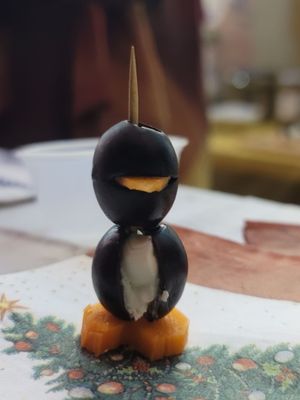 Cute little penguins:  olives  with cheese