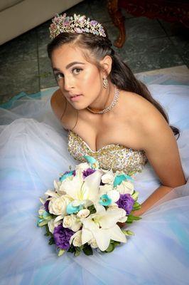 Custom Quinceañera ball gown by Fiesta Center in tones of blues and purples