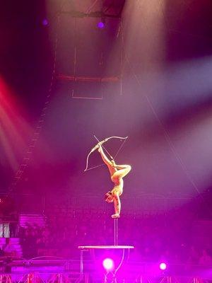 Balancing contortionist woman