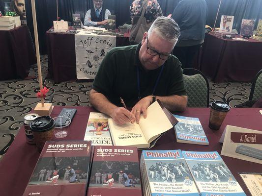 Famous baseball author Jon Daniel signing his amazing books. One of dozens of authors here.