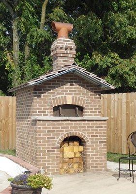 Custom-built outdoor wood-fired brick oven