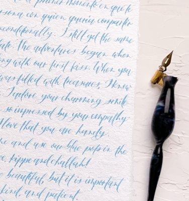 Handmade calligraphy featuring modern script and custom ink color for this love letter written on handmade paper 3