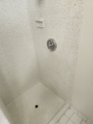 Shower surround and pan.