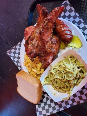 Riblets, sausage, leg quarter, Mac and cheese and green spaghetti...