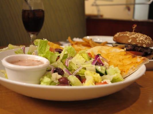 Greek Salad:  their menu stated Romaine Lettuce but they served  Iceberg.  A rip-off in my book.