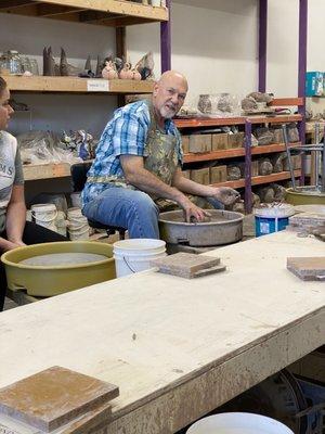 Owner, teaching us how to make a bowl